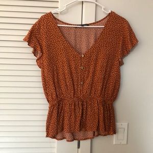 orange polka dot blouse